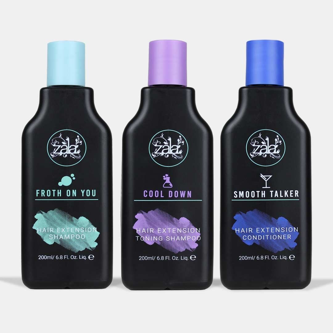 Three hair care product bottles are displayed on a clean white background.