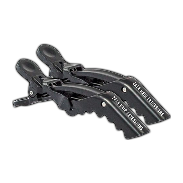 Two black sectioning clips labeled "Zala Hair Extensions" are positioned side by side.