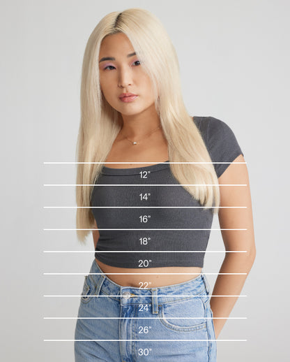 A chart displaying measurements for a woman wearing hair extensions.