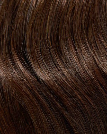 A swatch of dark brown hair, showcasing rich dark chocolate hair extensions for added volume and depth.