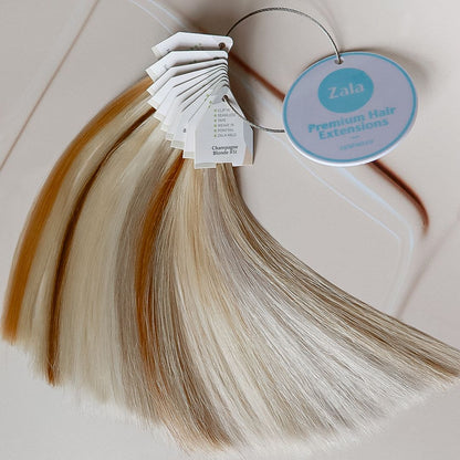 A color swatch ring of Zala Premium Hair Extensions featuring labels showcasing various colors available for purchase.