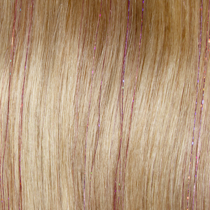 A swatch of blonde hair featuring vibrant pink and red streaks, enhanced with tinsel pink hair extensions.